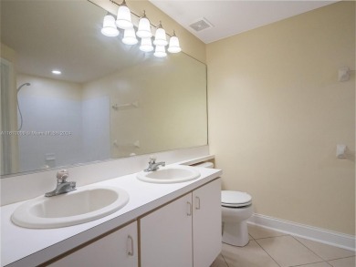 Highly renovated townhome conveniently located in the heart of on Jacaranda Golf Club in Florida - for sale on GolfHomes.com, golf home, golf lot