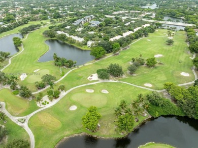 Highly renovated townhome conveniently located in the heart of on Jacaranda Golf Club in Florida - for sale on GolfHomes.com, golf home, golf lot