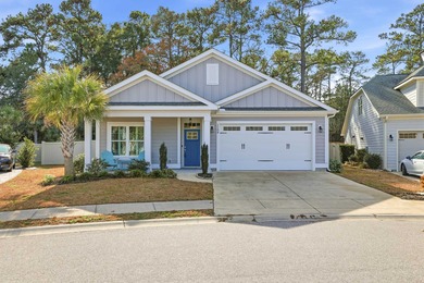Experience the ease of coastal living in this impeccably on Surf Golf and Beach Club in South Carolina - for sale on GolfHomes.com, golf home, golf lot