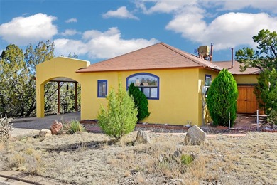 Discover a private sanctuary tucked away in a lush grove of on Pueblo de Cochiti Golf Course in New Mexico - for sale on GolfHomes.com, golf home, golf lot