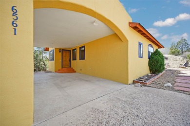 Discover a private sanctuary tucked away in a lush grove of on Pueblo de Cochiti Golf Course in New Mexico - for sale on GolfHomes.com, golf home, golf lot