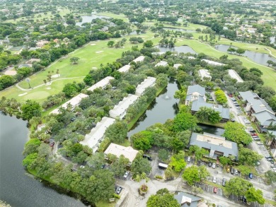 Highly renovated townhome conveniently located in the heart of on Jacaranda Golf Club in Florida - for sale on GolfHomes.com, golf home, golf lot