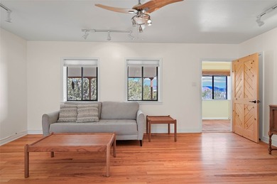 Discover a private sanctuary tucked away in a lush grove of on Pueblo de Cochiti Golf Course in New Mexico - for sale on GolfHomes.com, golf home, golf lot