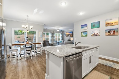 Experience the ease of coastal living in this impeccably on Surf Golf and Beach Club in South Carolina - for sale on GolfHomes.com, golf home, golf lot