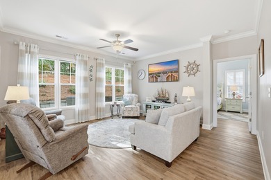 Experience the ease of coastal living in this impeccably on Surf Golf and Beach Club in South Carolina - for sale on GolfHomes.com, golf home, golf lot