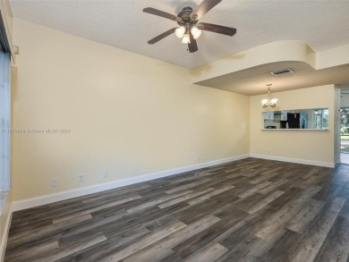 Highly renovated townhome conveniently located in the heart of on Jacaranda Golf Club in Florida - for sale on GolfHomes.com, golf home, golf lot