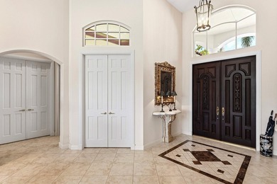 FULL GOLF MEMBERSHIP PURCHASE with this single-story residence on BallenIsles Golf and Country Club in Florida - for sale on GolfHomes.com, golf home, golf lot