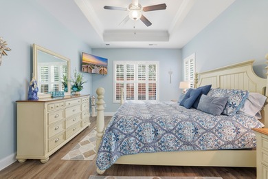 Experience the ease of coastal living in this impeccably on Surf Golf and Beach Club in South Carolina - for sale on GolfHomes.com, golf home, golf lot