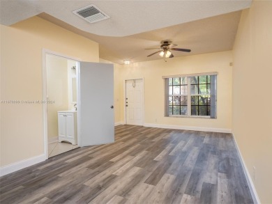 Highly renovated townhome conveniently located in the heart of on Jacaranda Golf Club in Florida - for sale on GolfHomes.com, golf home, golf lot