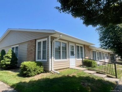 Corner unit Greenbriar with newer vinyl windows. Light and on Leisure Village Golf Course in New York - for sale on GolfHomes.com, golf home, golf lot