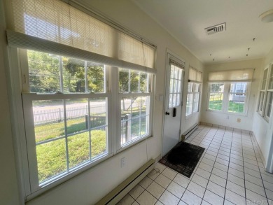 Corner unit Greenbriar with newer vinyl windows. Light and on Leisure Village Golf Course in New York - for sale on GolfHomes.com, golf home, golf lot