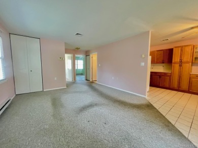 Corner unit Greenbriar with newer vinyl windows. Light and on Leisure Village Golf Course in New York - for sale on GolfHomes.com, golf home, golf lot