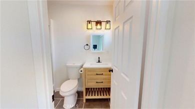 Welcome to this spacious 4-bedroom, 3-bath home perfectly on Palm Desert Country Club in California - for sale on GolfHomes.com, golf home, golf lot