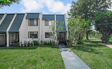 Beautiful and completely remodeled corner unit townhouse with on Fountains Golf and Country Club in Florida - for sale on GolfHomes.com, golf home, golf lot