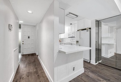 Beautiful and completely remodeled corner unit townhouse with on Fountains Golf and Country Club in Florida - for sale on GolfHomes.com, golf home, golf lot