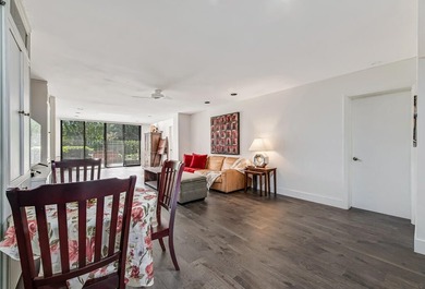 Beautiful and completely remodeled corner unit townhouse with on Fountains Golf and Country Club in Florida - for sale on GolfHomes.com, golf home, golf lot