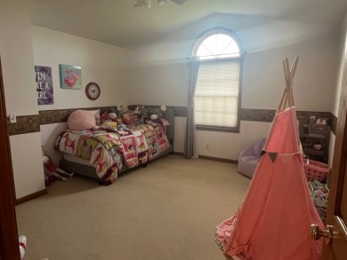 This 3 bedroom, 3 bath home with 3 car garage is located on a on Gibson Woods Golf Course in Illinois - for sale on GolfHomes.com, golf home, golf lot