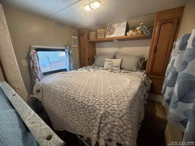 Move - in ready getaway!! Don't miss this charming 2 bedroom, 1 on River Ridge Golf Club in Virginia - for sale on GolfHomes.com, golf home, golf lot