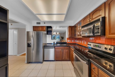 WELCOME HOME TO THIS CHARMING 2 BEDROOM, 2 BATH CONDO WITH on Marina Lakes Golf Course in Florida - for sale on GolfHomes.com, golf home, golf lot