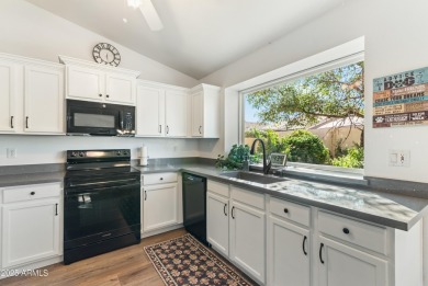 Quiet comfort meets active living in this inviting 2-bedroom on Sun Village Golf Course in Arizona - for sale on GolfHomes.com, golf home, golf lot
