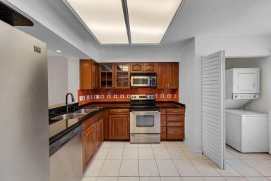 WELCOME HOME TO THIS CHARMING 2 BEDROOM, 2 BATH CONDO WITH on Marina Lakes Golf Course in Florida - for sale on GolfHomes.com, golf home, golf lot