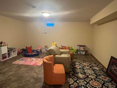 This 3 bedroom, 3 bath home with 3 car garage is located on a on Gibson Woods Golf Course in Illinois - for sale on GolfHomes.com, golf home, golf lot