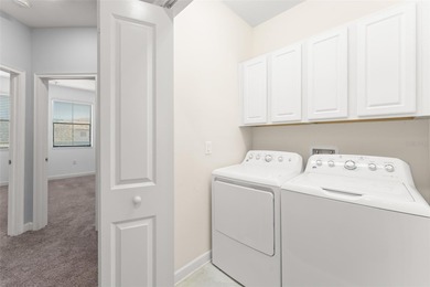 **This house comes with a REDUCED RATE through the seller's on ChampionsGate Golf Resort in Florida - for sale on GolfHomes.com, golf home, golf lot