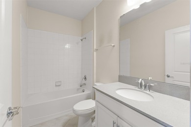 **This house comes with a REDUCED RATE through the seller's on ChampionsGate Golf Resort in Florida - for sale on GolfHomes.com, golf home, golf lot