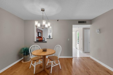 WELCOME HOME TO THIS CHARMING 2 BEDROOM, 2 BATH CONDO WITH on Marina Lakes Golf Course in Florida - for sale on GolfHomes.com, golf home, golf lot