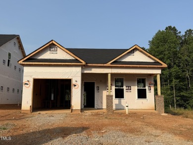 Premium lot! You will love this beautiful new ranch home in on Riverwood Golf and Athletic Club in North Carolina - for sale on GolfHomes.com, golf home, golf lot