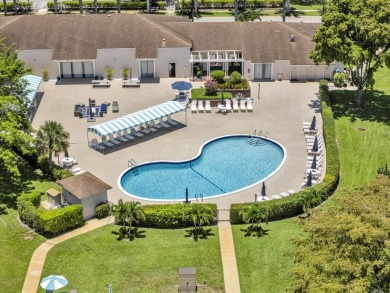 WELCOME HOME TO THIS CHARMING 2 BEDROOM, 2 BATH CONDO WITH on Marina Lakes Golf Course in Florida - for sale on GolfHomes.com, golf home, golf lot