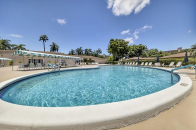 WELCOME HOME TO THIS CHARMING 2 BEDROOM, 2 BATH CONDO WITH on Marina Lakes Golf Course in Florida - for sale on GolfHomes.com, golf home, golf lot