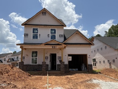 Premium lot! This gorgeous residence highlights classic comforts on Riverwood Golf and Athletic Club in North Carolina - for sale on GolfHomes.com, golf home, golf lot