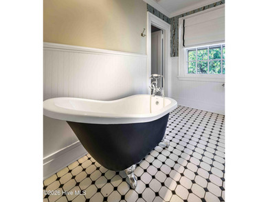 Thistle Dhu is a celebrated Pinehurst landmark where American on Pinehurst Resort and Country Club in North Carolina - for sale on GolfHomes.com, golf home, golf lot