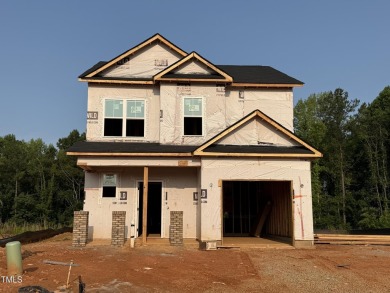 Premium lot! This gorgeous residence highlights classic on Riverwood Golf and Athletic Club in North Carolina - for sale on GolfHomes.com, golf home, golf lot