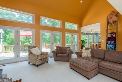 Perched on a slight slope overlooking the 11th fairway of the on Jennings Mill Country Club in Georgia - for sale on GolfHomes.com, golf home, golf lot