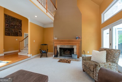 Perched on a slight slope overlooking the 11th fairway of the on Jennings Mill Country Club in Georgia - for sale on GolfHomes.com, golf home, golf lot