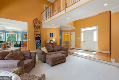 Perched on a slight slope overlooking the 11th fairway of the on Jennings Mill Country Club in Georgia - for sale on GolfHomes.com, golf home, golf lot