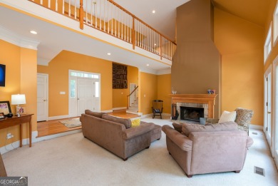 Perched on a slight slope overlooking the 11th fairway of the on Jennings Mill Country Club in Georgia - for sale on GolfHomes.com, golf home, golf lot