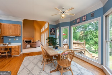 Perched on a slight slope overlooking the 11th fairway of the on Jennings Mill Country Club in Georgia - for sale on GolfHomes.com, golf home, golf lot