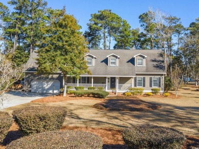 Welcome to this stunning 4-bedroom home nestled in the heart of on Wedgefield Plantation Golf Club in South Carolina - for sale on GolfHomes.com, golf home, golf lot