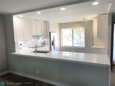 THIS IS GREAT OPPORTUNITY TO OWN A BEAUTIFUL SECOND FLOOR UNIT on Indian Spring Golf and Country Club in Florida - for sale on GolfHomes.com, golf home, golf lot