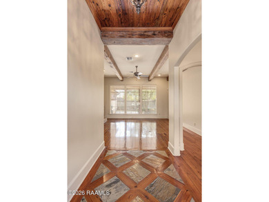 Located within the gated Le Triomphe community, this French on LeTriomphe Golf and Country Club in Louisiana - for sale on GolfHomes.com, golf home, golf lot