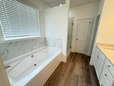 The Saxton IV by My Home Communities is located on a desirable on Harbor Club Golf and Country Club in Georgia - for sale on GolfHomes.com, golf home, golf lot