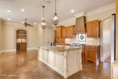 Located within the gated Le Triomphe community, this French on LeTriomphe Golf and Country Club in Louisiana - for sale on GolfHomes.com, golf home, golf lot