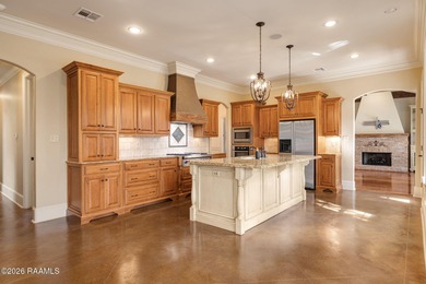 Located within the gated Le Triomphe community, this French on LeTriomphe Golf and Country Club in Louisiana - for sale on GolfHomes.com, golf home, golf lot