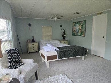 ZELLWOOD STATION 2 BEDROOM 2 BATH HOME located on a quiet on Zellwood Station Country Club in Florida - for sale on GolfHomes.com, golf home, golf lot