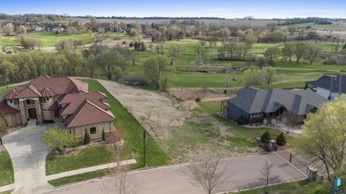 Golf Course Lot in Arbors Edge A stunning .78-acre lot is on Willow Run Golf Course in South Dakota - for sale on GolfHomes.com, golf home, golf lot