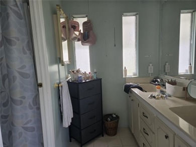 ZELLWOOD STATION 2 BEDROOM 2 BATH HOME located on a quiet on Zellwood Station Country Club in Florida - for sale on GolfHomes.com, golf home, golf lot