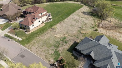 Golf Course Lot in Arbors Edge A stunning .78-acre lot is on Willow Run Golf Course in South Dakota - for sale on GolfHomes.com, golf home, golf lot